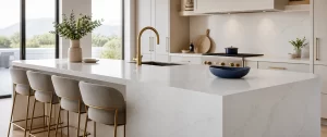 Polished light quartz kitchen island with subtle veining in a clean modern kitchen