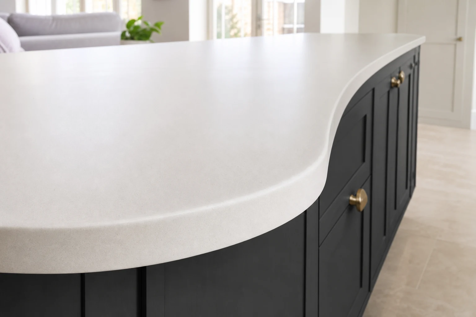 Finished Corian worktop with a smooth curved breakfast bar edge